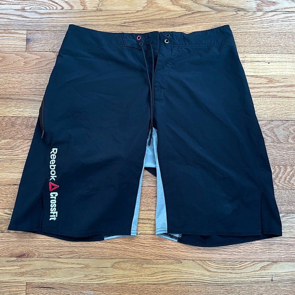 Black and gray Reebok CrossFit training shorts.